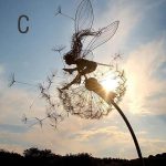 dancing-fairy-statue-steel-garden-824468.jpg